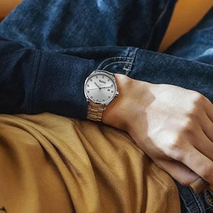 Detailed side view of the RADO watch case and crown, highlighting the steel finish. Premium watches at Nayvo Noir.